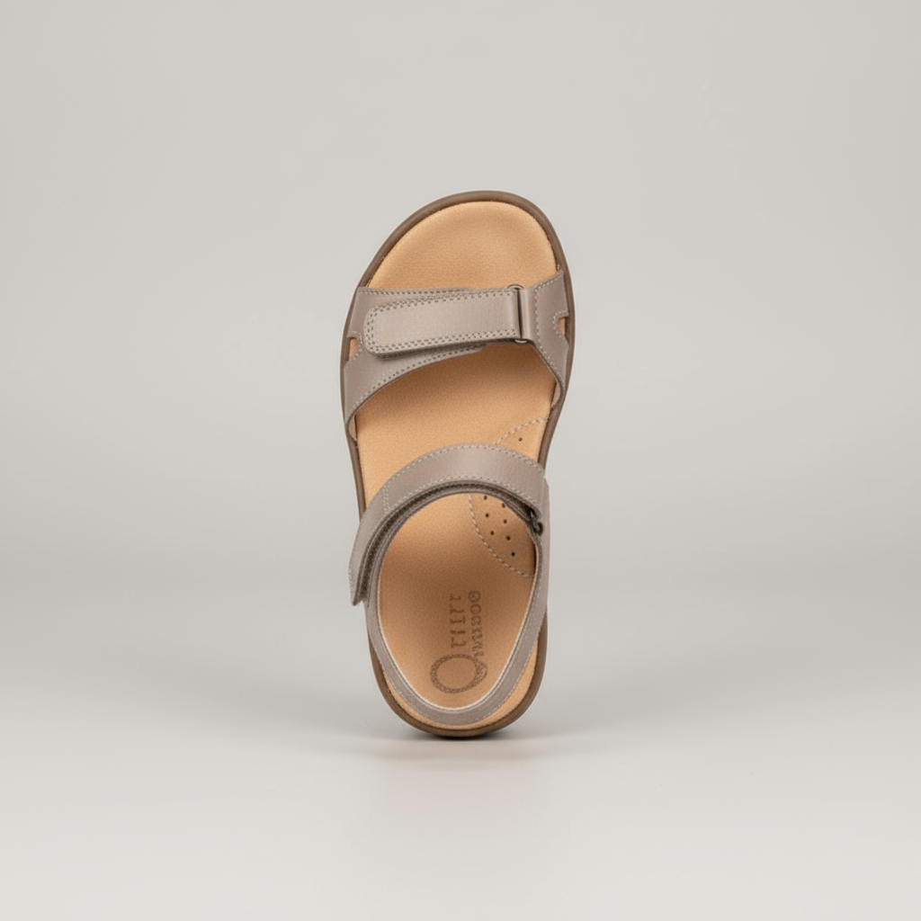 Taupe sandal on a light gray background