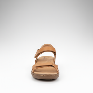 Tan sandal on a white background
