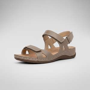 Beige sandal on a light gray background