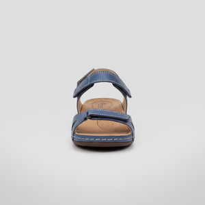 Blue sandal on a light gray background