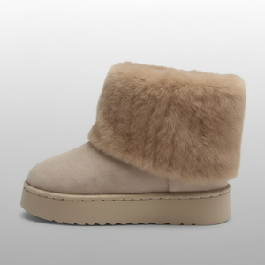 Beige boot with fur trim on a light gray background