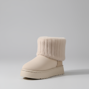 Beige winter boot with knitted cuff on a light gray background