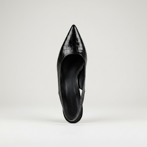Black pointed-toe high-heeled shoe on a light gray background