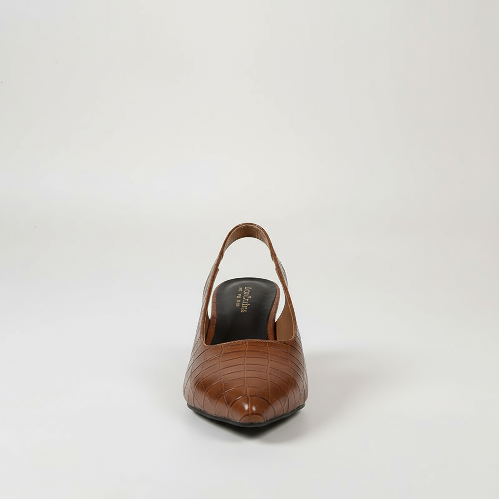 Brown crocodile-patterned high heel shoe on a white background