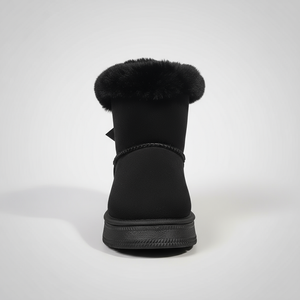 Black snow boot with fur trim on a white background
