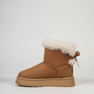 Brown winter boot with white fur trim on a light gray background