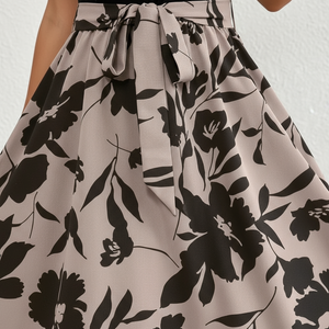 Skirt with black floral pattern on a beige background