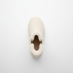 White slip-on shoe on a light gray background