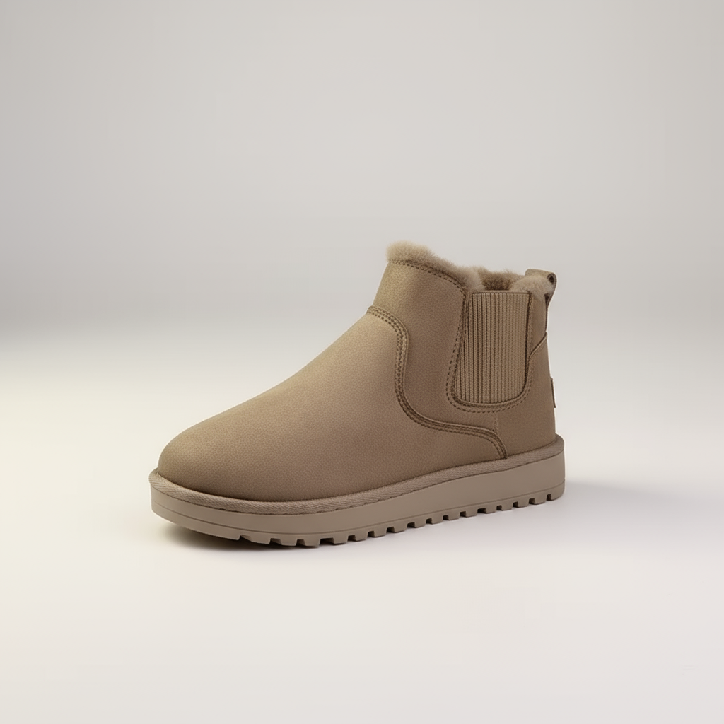 Beige Chelsea boot on a light gray background
