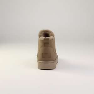Tan winter boot with fur lining on a light gray background