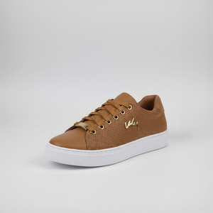 Brown sneaker with white sole on a light gray background