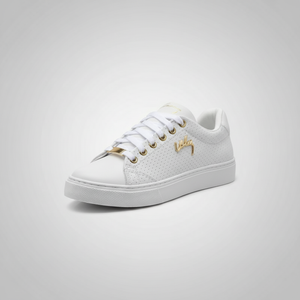 White sneaker with gold accents on a light gray background