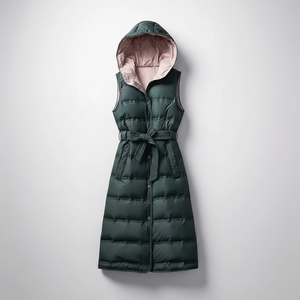 Green puffer vest with a hood on a light gray background
