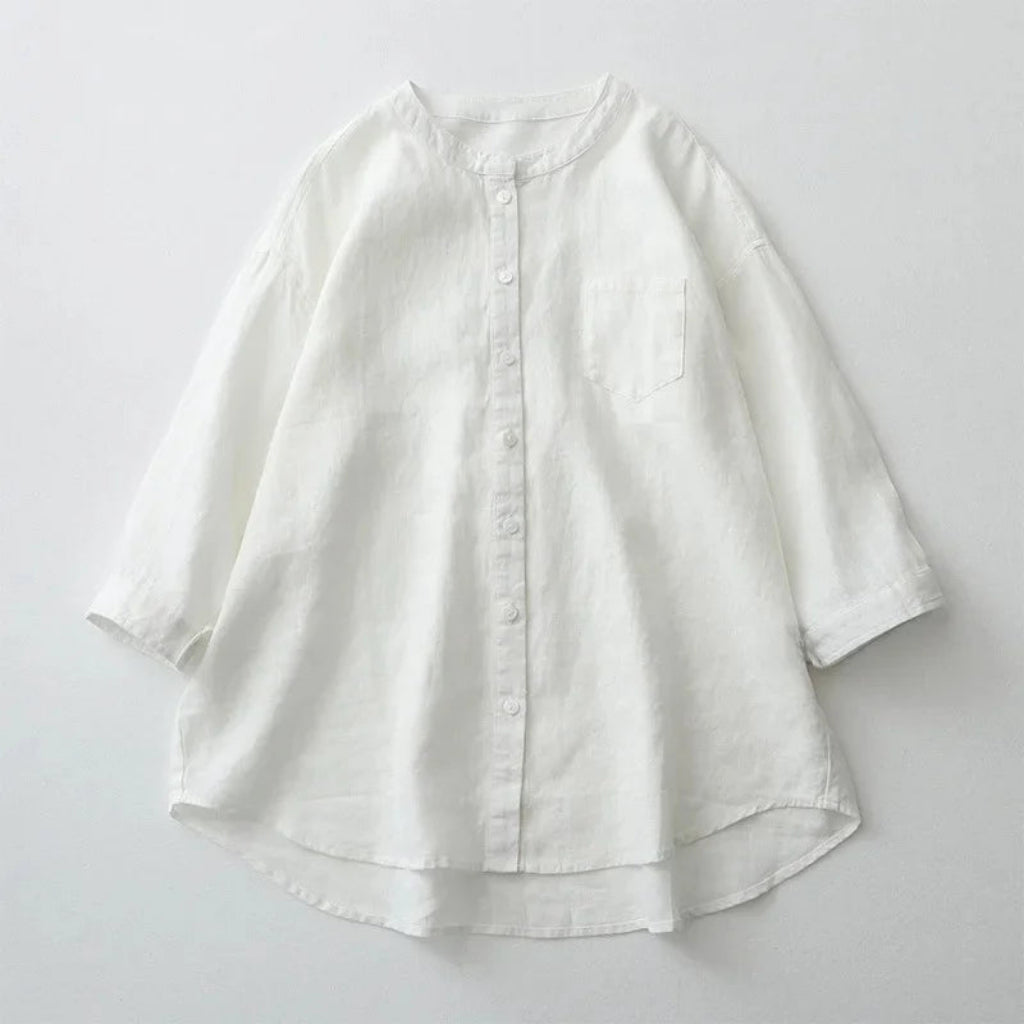 White button-up shirt on a light gray background