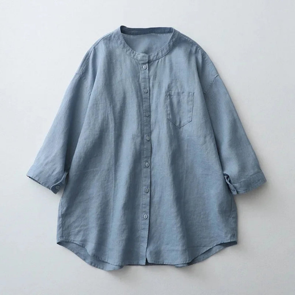 Blue shirt on a light gray background
