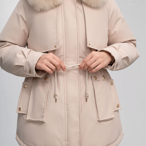 Beige parka with fur hood on a light gray background
