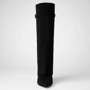 Black knee-high boot on a white background