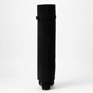 Black knee-high boot on a white background