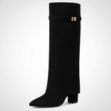 Black knee-high boot with a strap on a white background