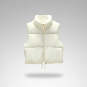 White puffer vest on a light gray background