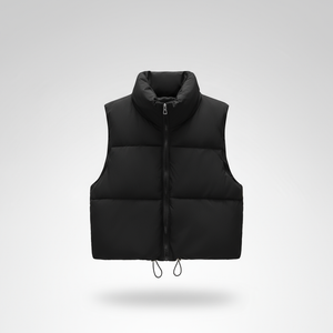 Black puffer vest on a light gray background