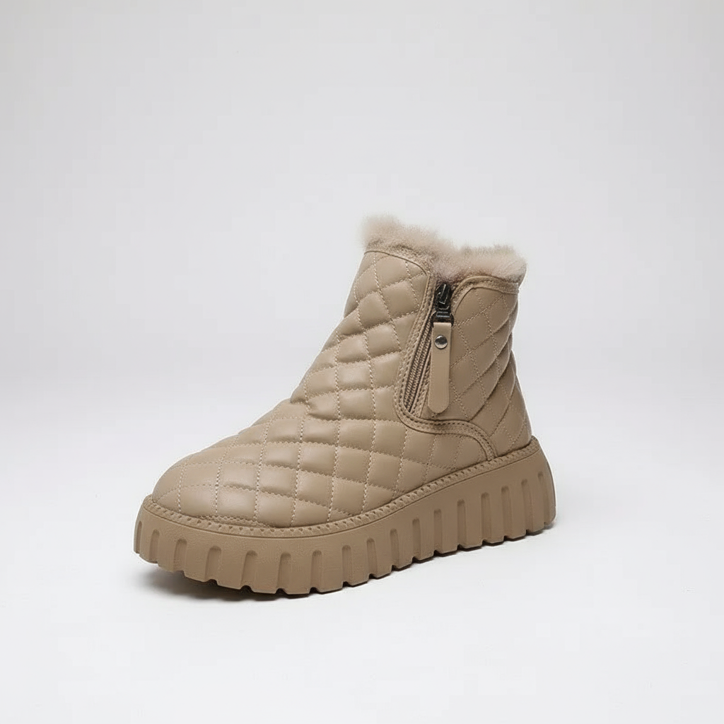 Beige quilted winter boot with fur lining on a white background