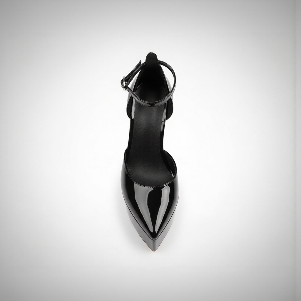 Black high-heeled shoe on a light gray background