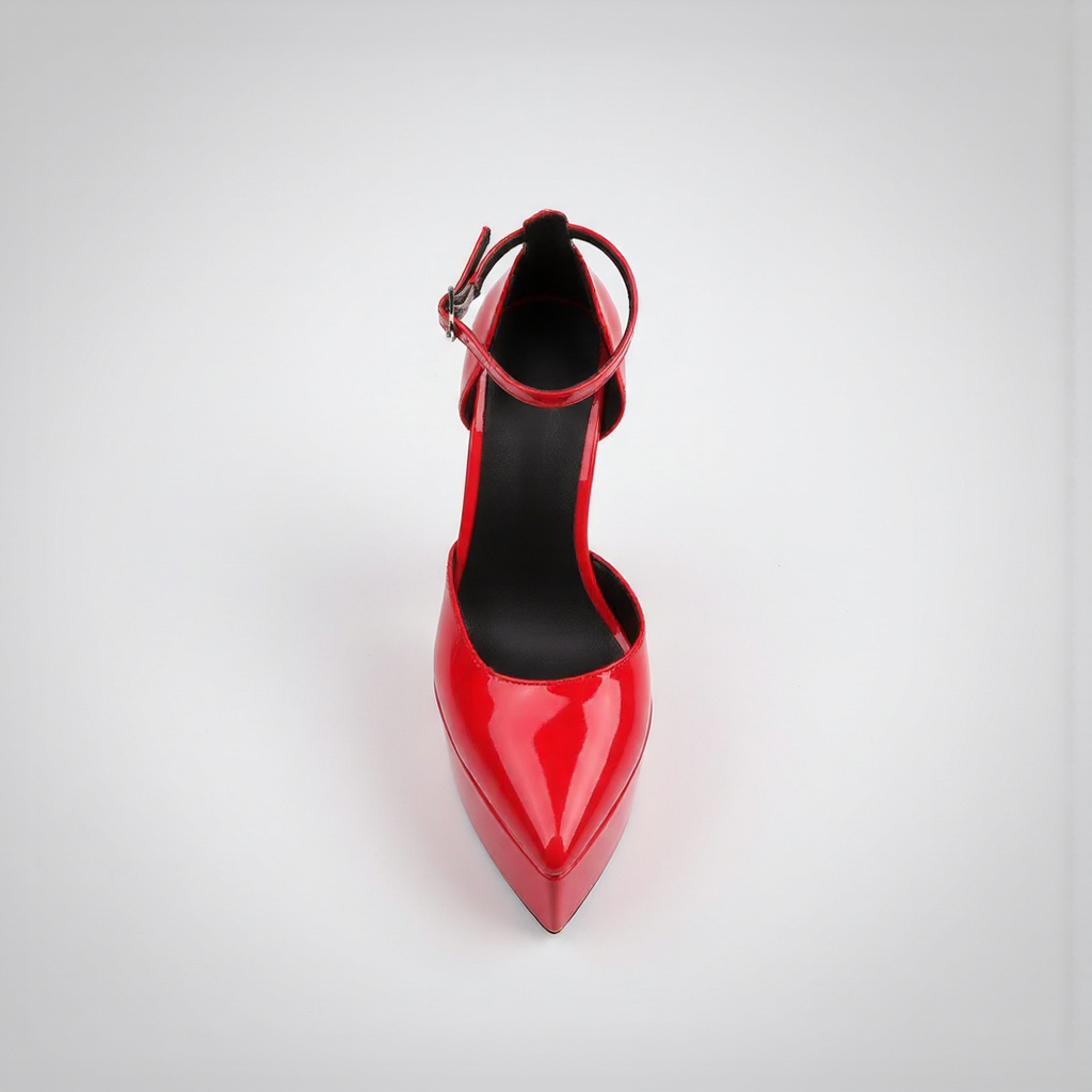 Red high-heeled shoe on a light gray background