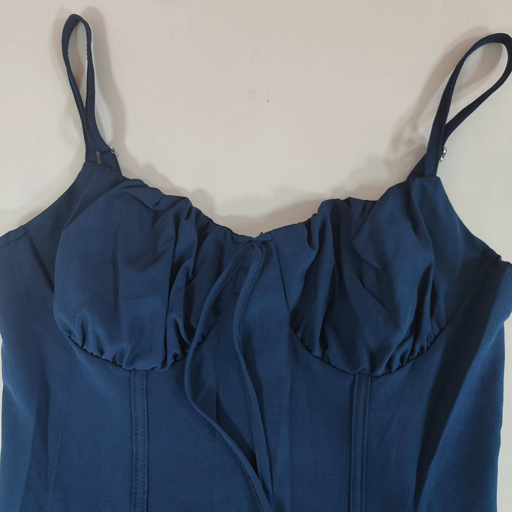 Blue dress with ruched neckline on a white background