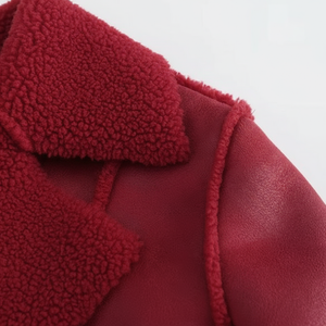 Close-up of a red textured fabric with a white background
