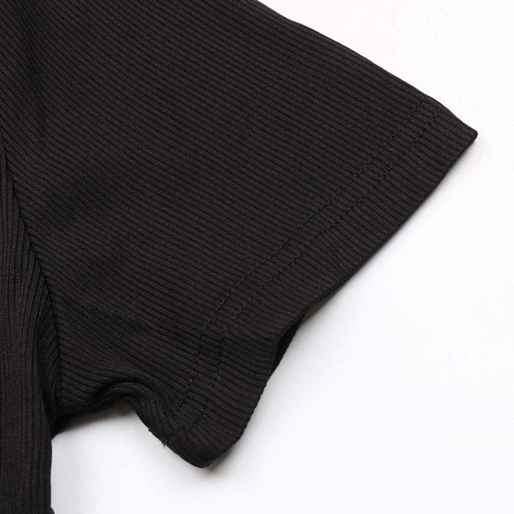 Black ribbed knit sweater on a white background
