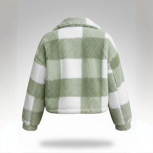 Green and white checkered fleece jacket on a gray background