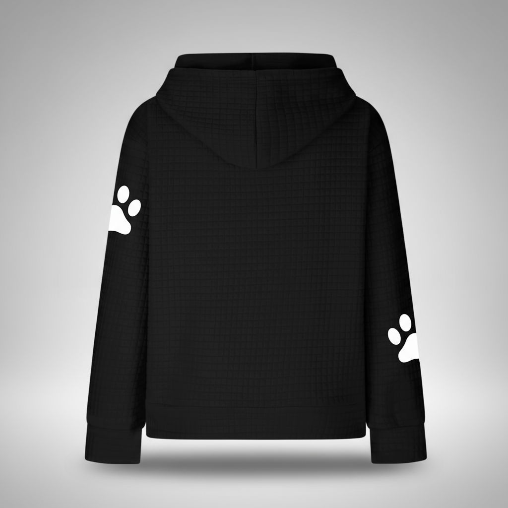 Black hoodie with white paw prints on sleeves against a gray background