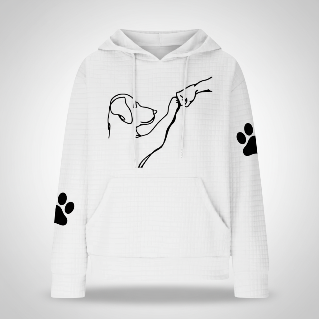 White hoodie with black line art of a dog and paw prints on a white background