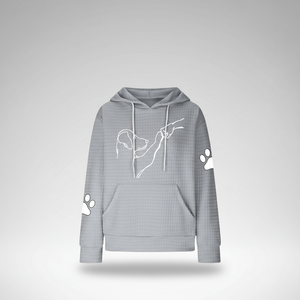 Gray hoodie with white paw print designs on a light gray background