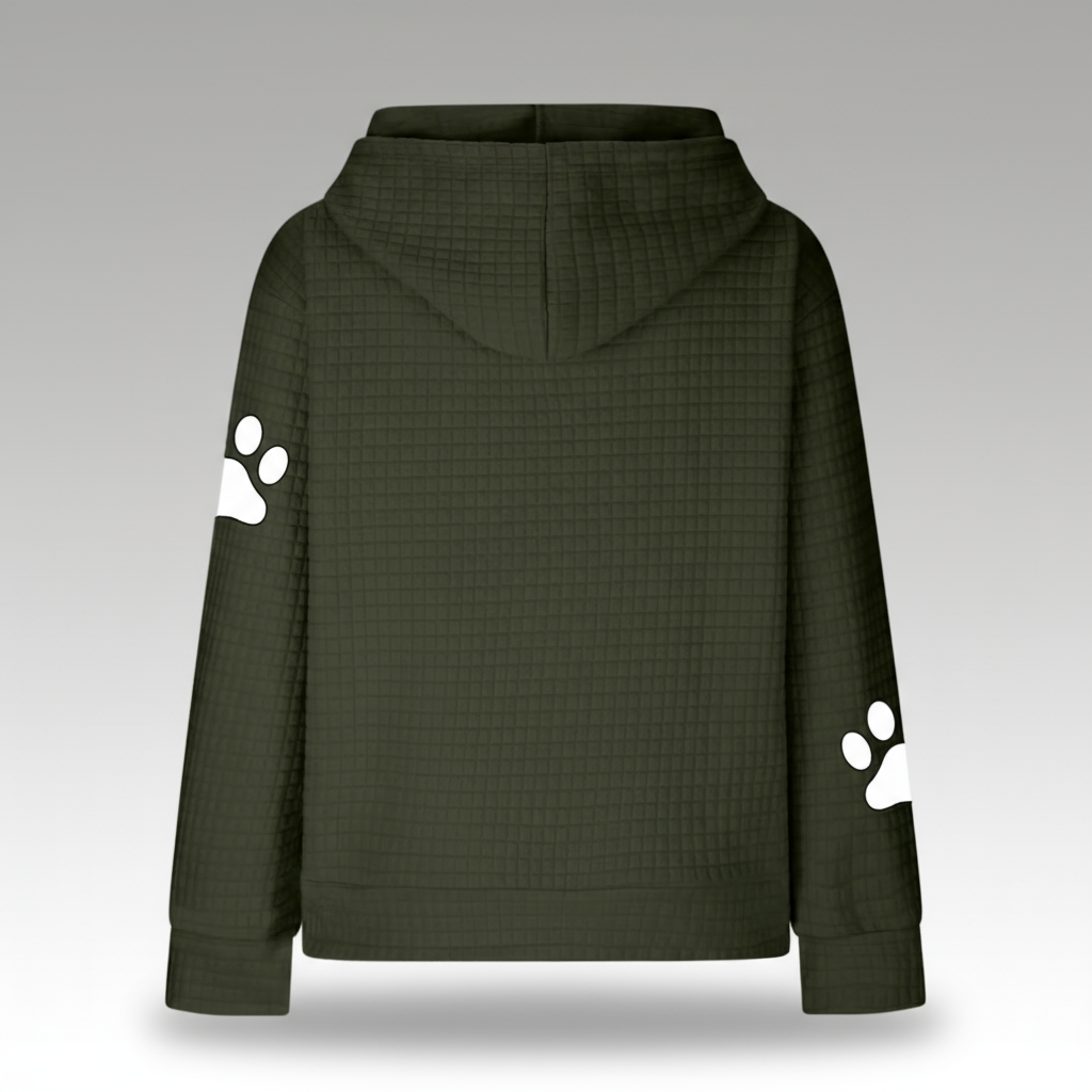 Green hoodie with white paw prints on sleeves against a gray background