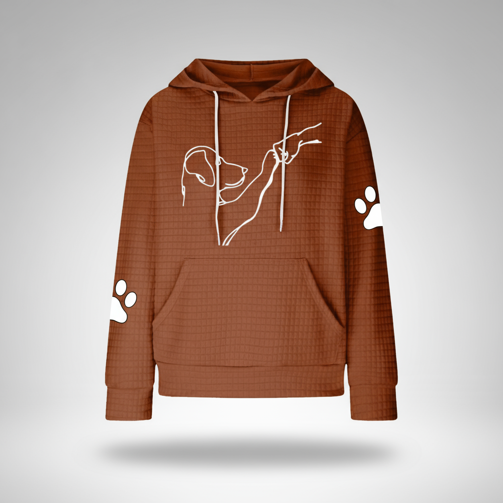 Brown hoodie with white dog design and paw prints on a gray background
