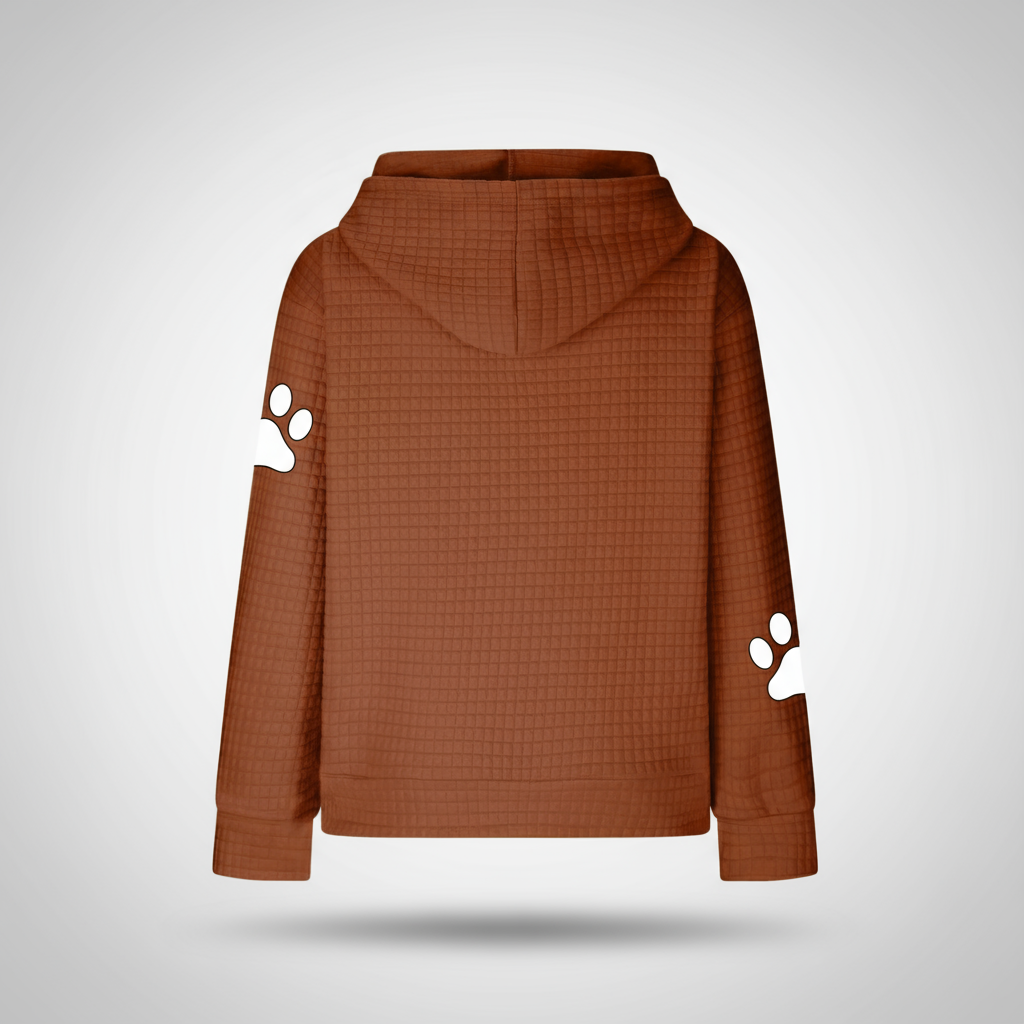 Brown hoodie with paw print designs on sleeves against a light gray background