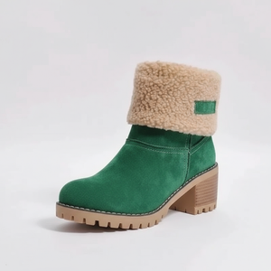 Green boot with beige fur lining on a white background