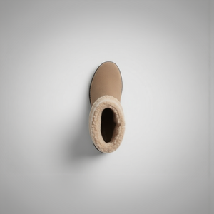 Beige ankle boot with fur trim on a light gray background