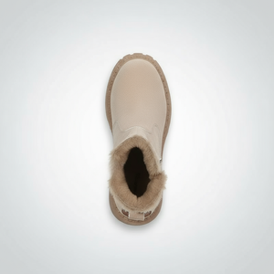 Beige winter boot with fur trim on a white background