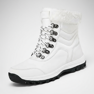 White winter boot with black sole on a light gray background