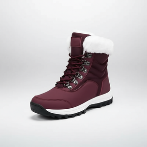 Maroon winter boot with white fur lining on a light gray background