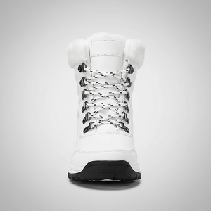 White winter boot with black sole on a light gray background