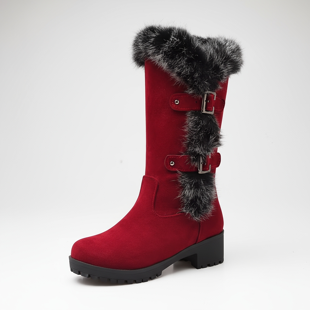 Red boot with black fur trim on a white background