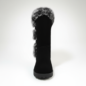 Black winter boot with fur trim on a white background