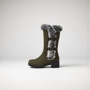 Green winter boot with fur trim on a white background