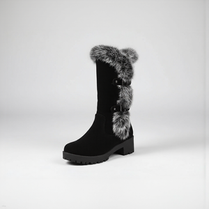 Black boot with fur trim on a white background
