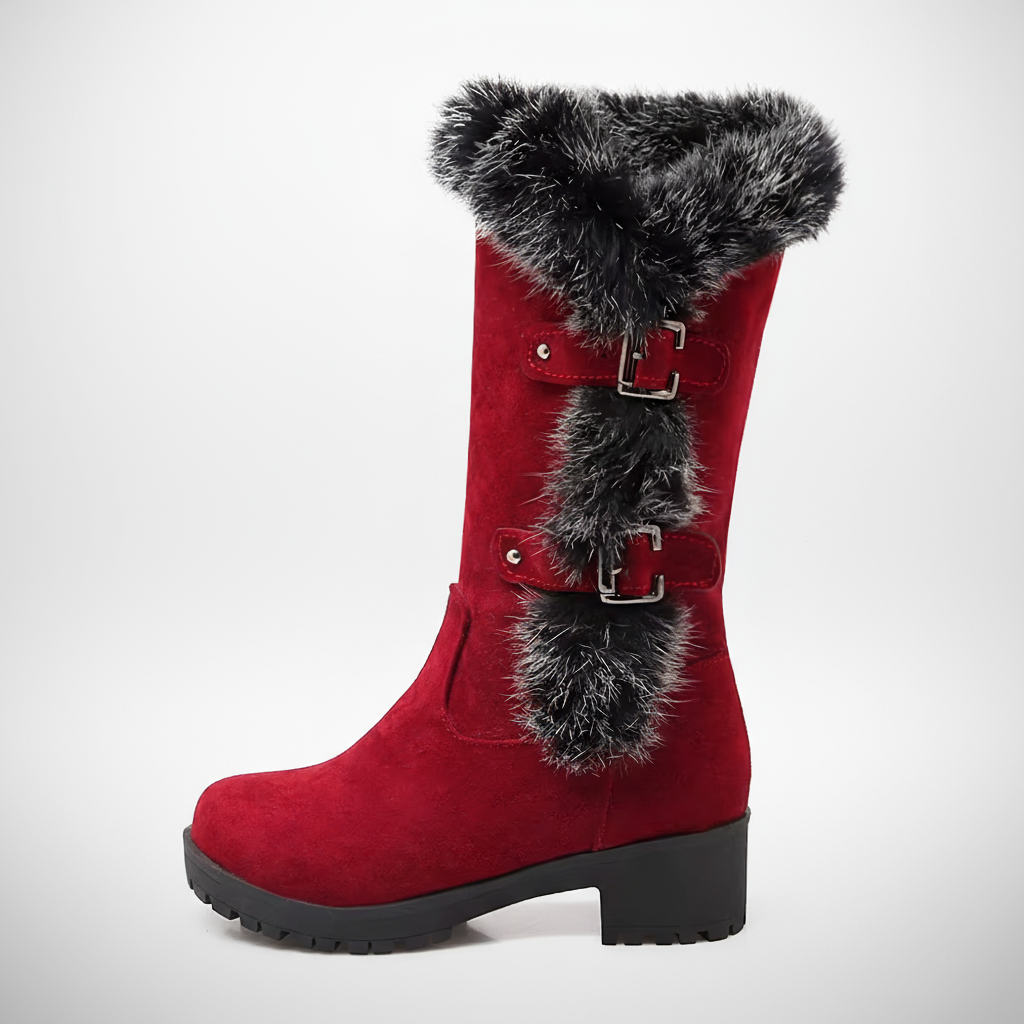 Red boot with black fur trim on a white background
