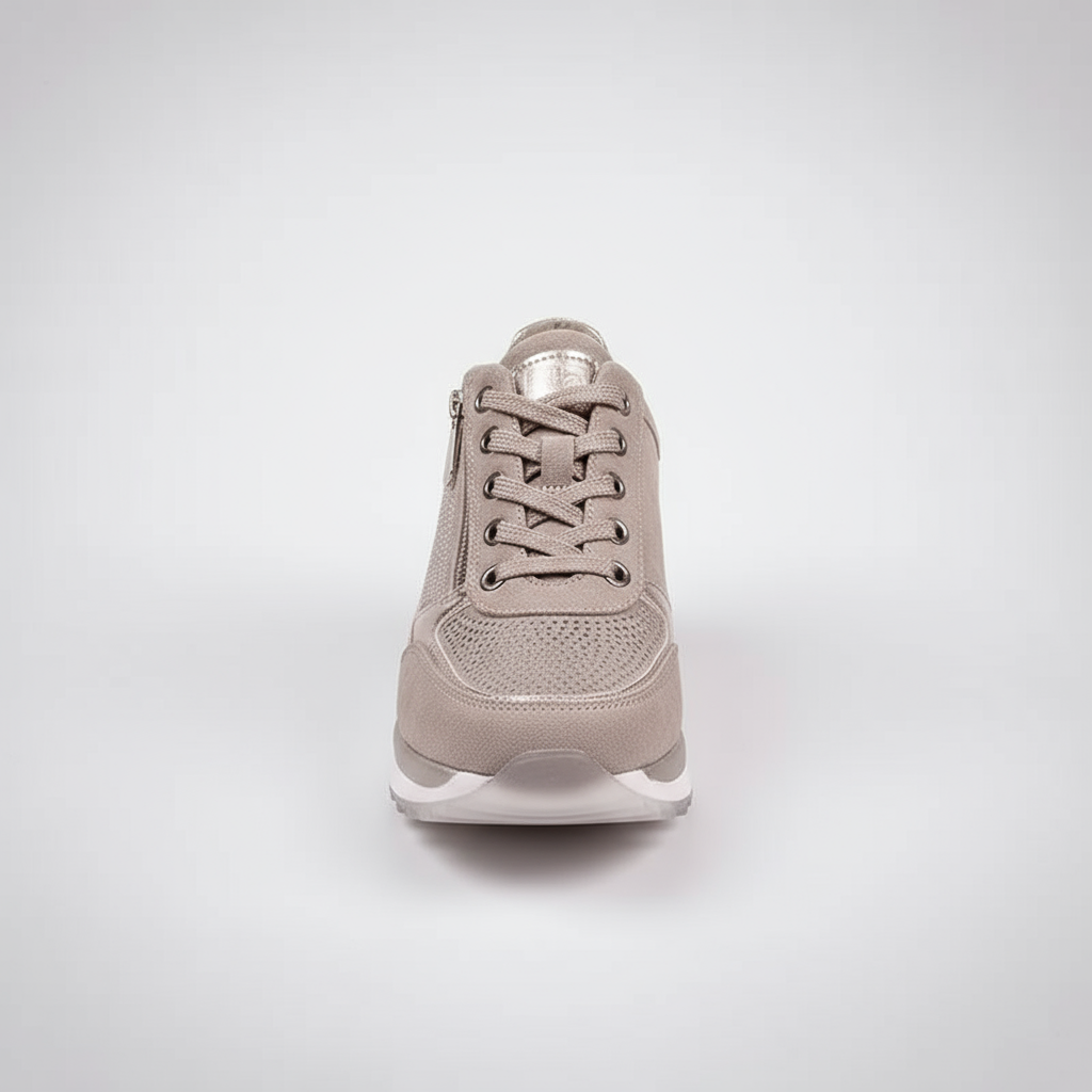 Beige sneaker on a light gray background